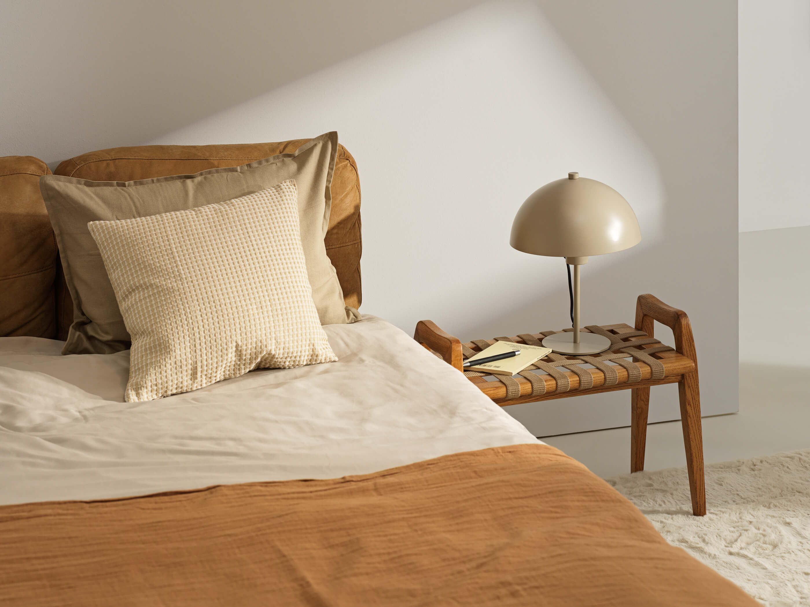 Kissen auf einem Bett